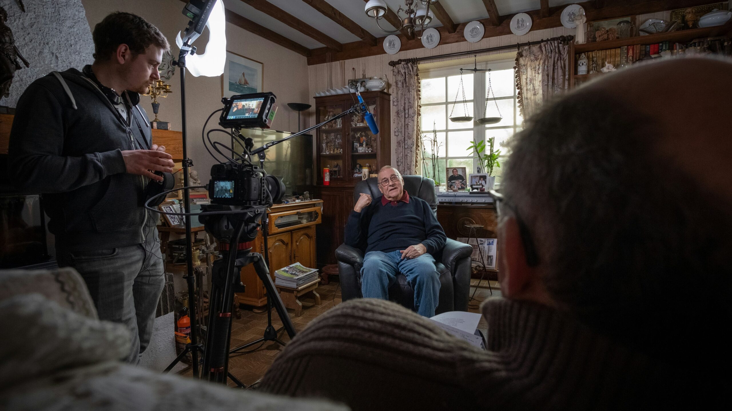 Church member sharing a personal testimony during a recorded interview